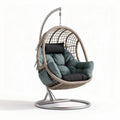 Hanging rattan egg chair with steel frame and cushions in grey and beige